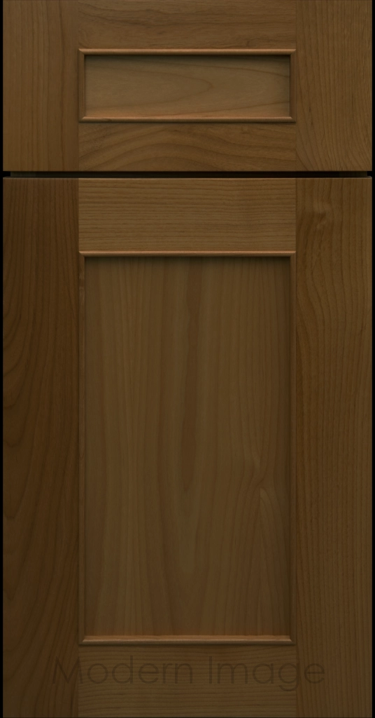 Detail view of a Chandler Shaker cabinet door in Cognac stain with raised molding along the inner panel.
